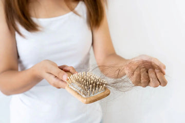 Everything You Need to Know About Postpartum Hair Loss